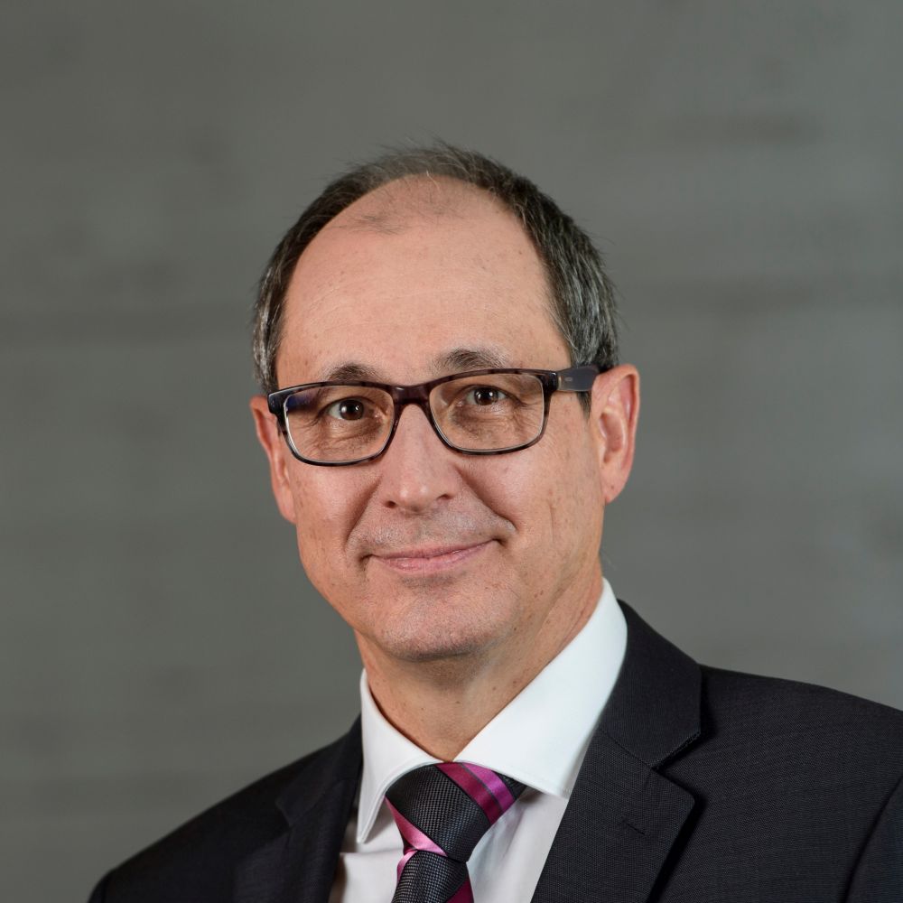 H.E. Urs Schmid